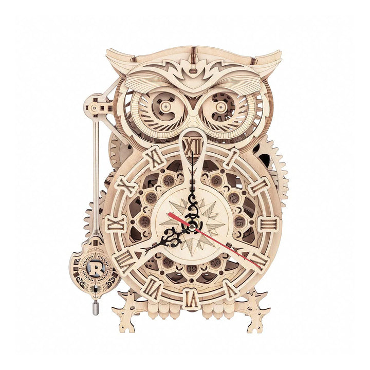 Wooden mechanical owl clock model on a white background