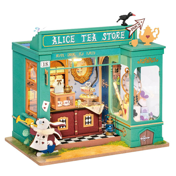 Model of a tea store named 'Alice Tea Store' with decorative elements and a clock.