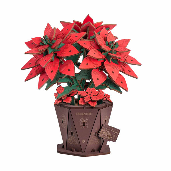 Red wood 3d puzzle flower plant in a brown pot on a white background
